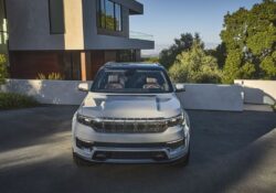 Subaru Outback and Jeep Grand Cherokee parked side by side showcasing design and size differences